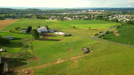 Aerial-drone-view-of-agriculture-farmland-during-sunset