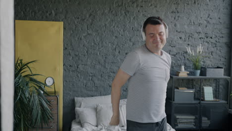 man dancing in his bedroom