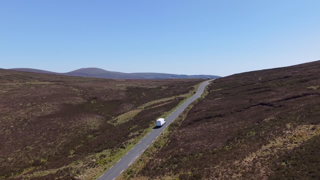 The Last Mile: A Drone Tracking a Delivery Van in a Rural Road in Wicklow Mountains