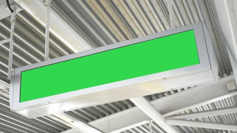 electronic billboard advertising board empty green screen train station panel