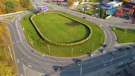 aerial 4k footage of traffic at a specific roundabout in kaunas, lithuania