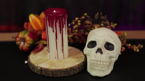 skull and bloody candle. autumn decorations,