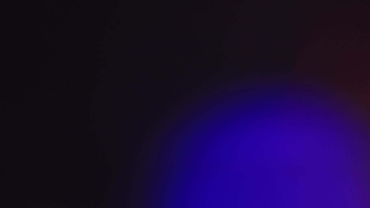 Rapidly shimmering out of focus Christmas multicolored lights.