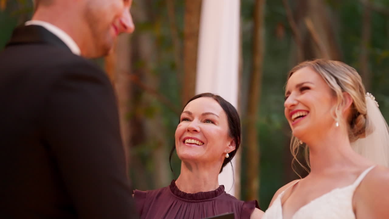 Smiling Bride And Celebrant Laughing At Outdoor Wedding Ceremony Alter, 4K Resolution Slow Motion