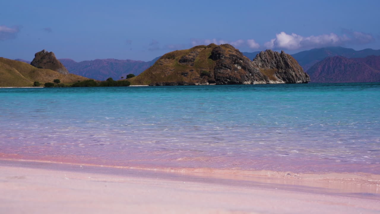 Pristine Water Of Pink Beach At The Komodo Island In Flores, Indonesia. wide shot