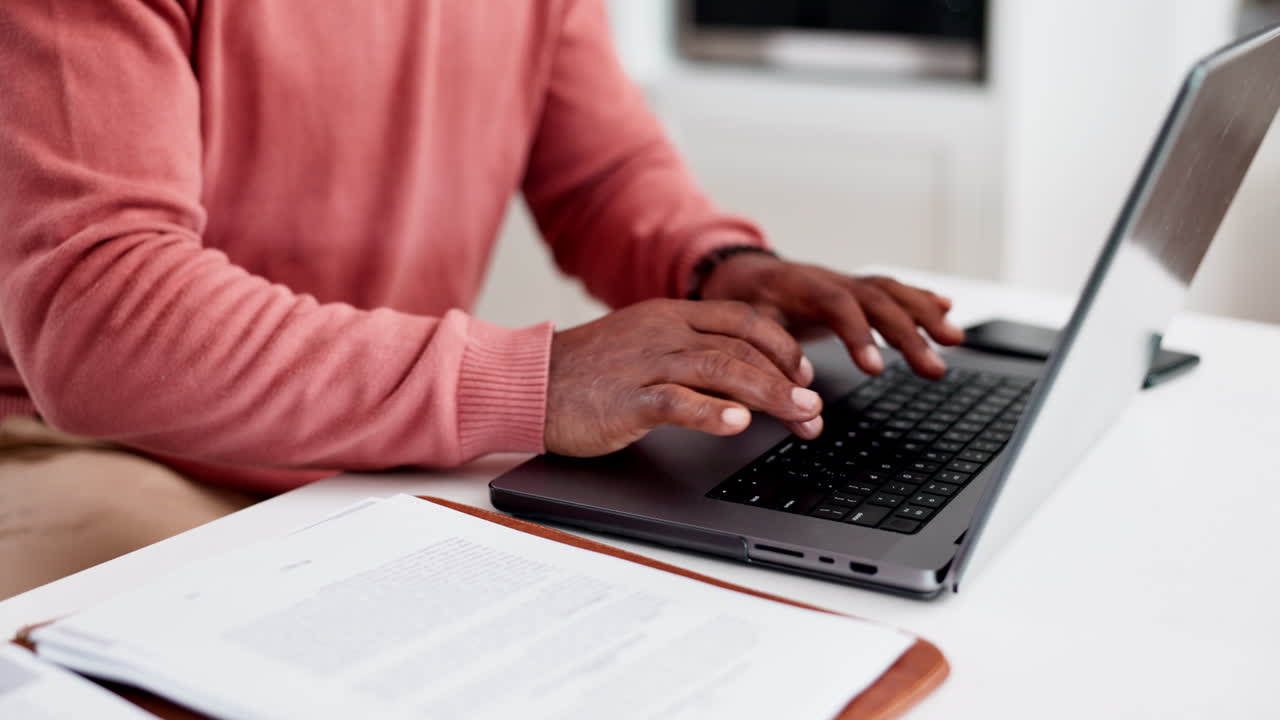 Hands, typing on laptop and documents for home