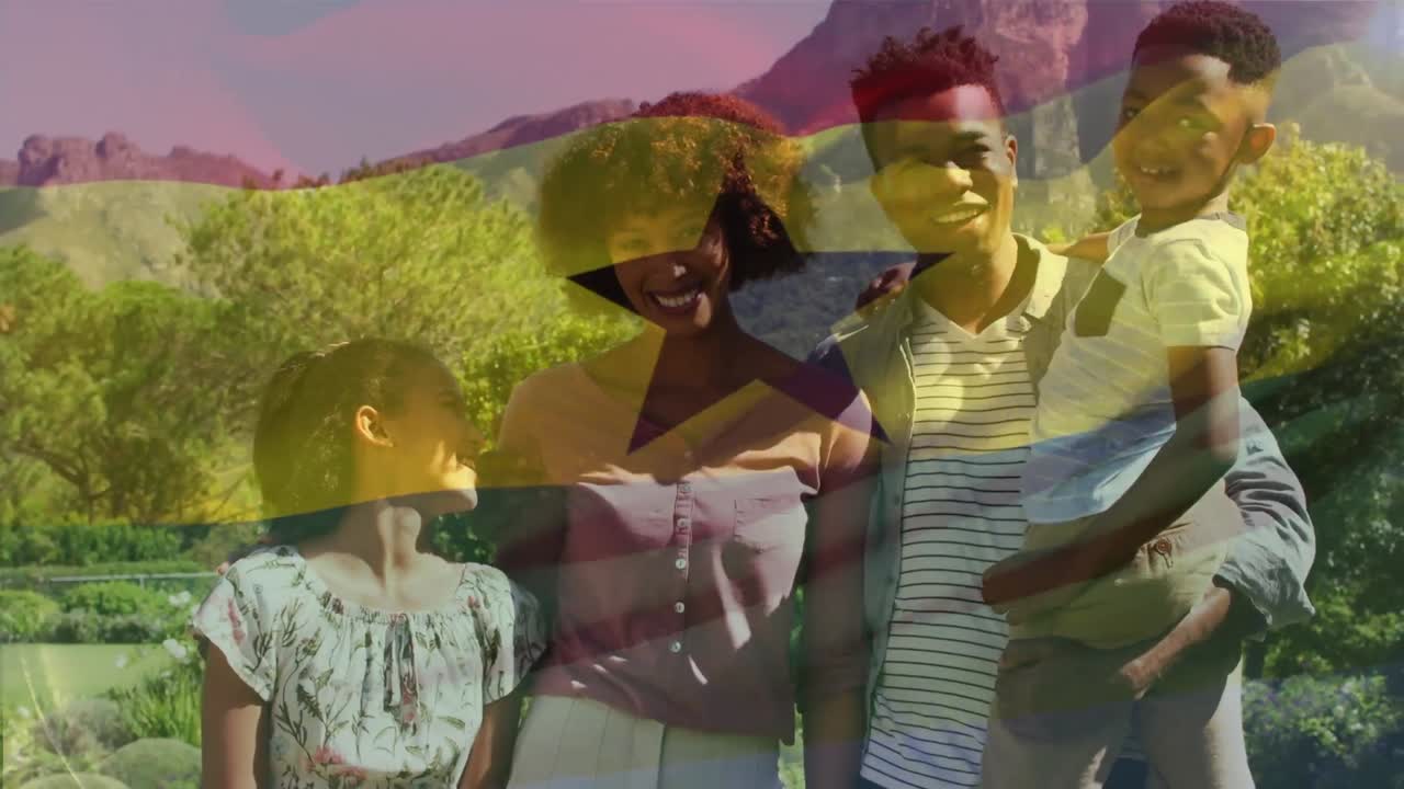 아프리카계 미국인 가족 위에 있는 가나 국기 애니메이션