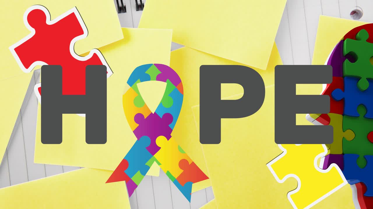 인간의 뇌 위에 떨어지는 퍼즐의 애니메이션, 퍼즐로 형성된 희망 텍스트와 리본