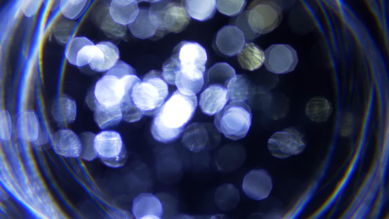 Shimmering Blue Bokeh Light Circles Appearing and Fading