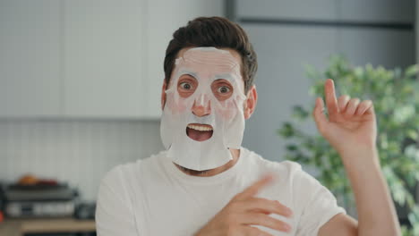 man wearing a face mask making a funny expression