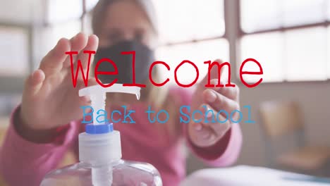 Animation-of-words-welcome-back-to-school-over-girl-disinfecting-her-hands