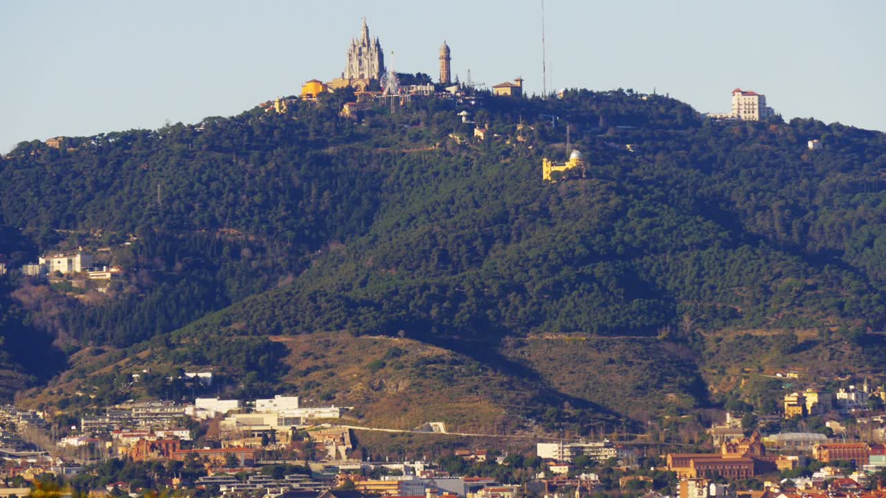 sun light barcelona city tibidabo church and park view 4k spain