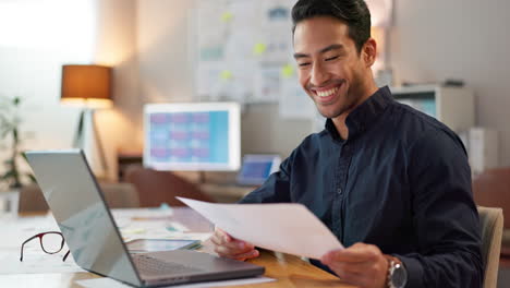 businessman in office, typing on laptop and smile