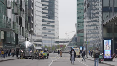 modern city street scene with food trucks and buildings