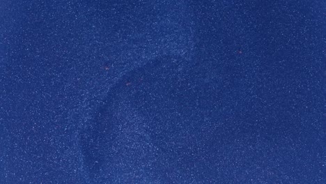 the dark glitter paint shimmers beautifully slowly
