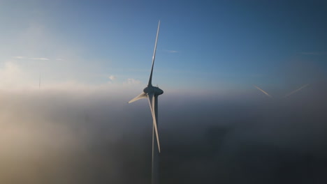 Cinematic-view-of-wind-turbines-in-the-misty-sky