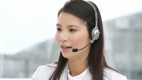 pretty businesswoman with headset on