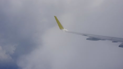 flying through clouds - view from a plane