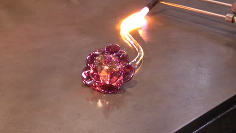 fire glowing through a recently created glass rose