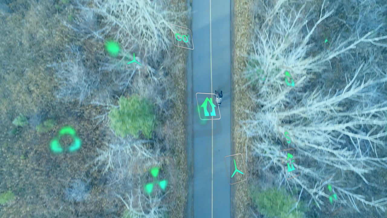 Using animation, drone captures person on road with digital navigation over forest