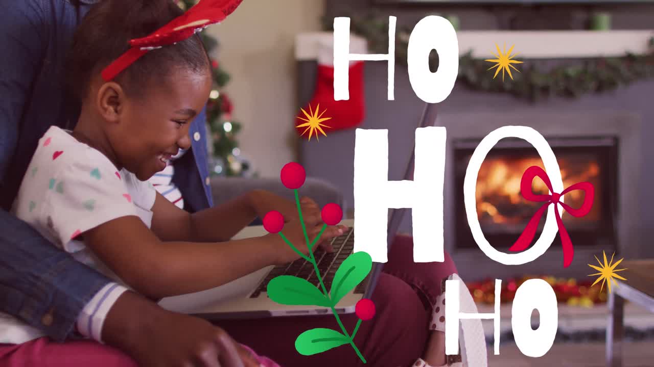Animation of christmas greetings text over african american family at christmas