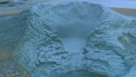 slow motion footage and close-up of blue boiling mud pots in hverir - namafjall geothermal area in iceland