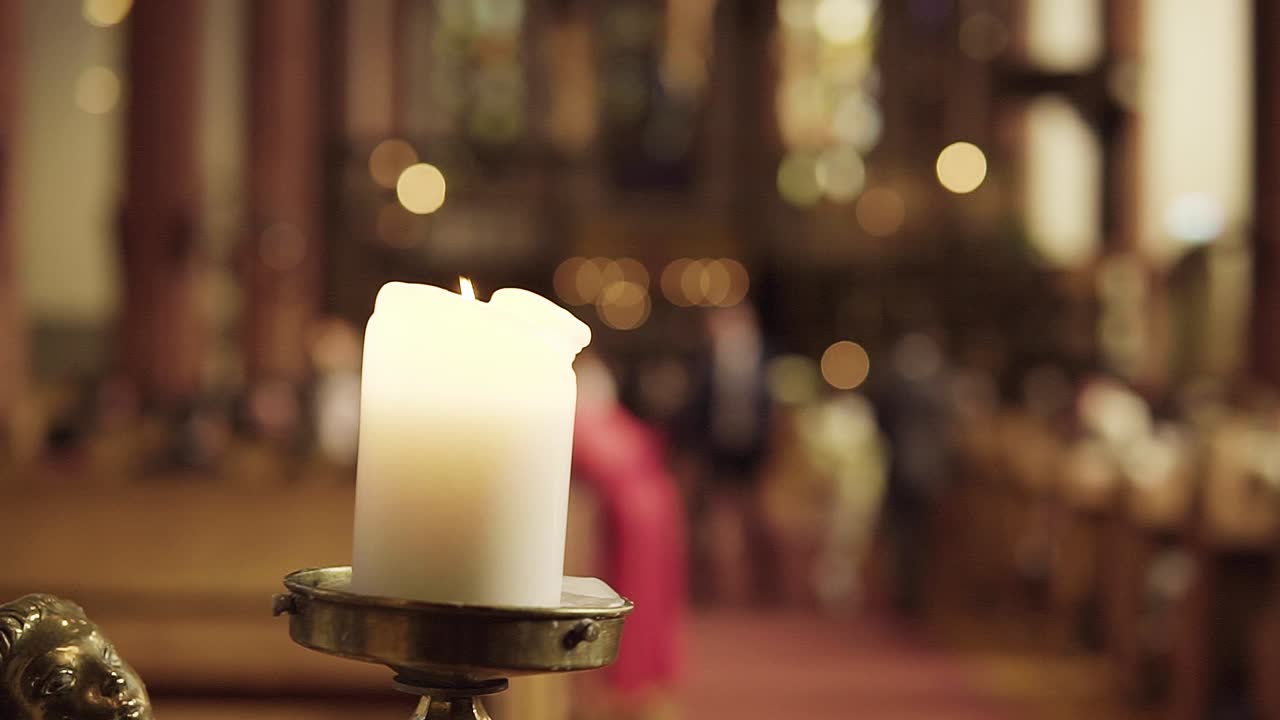 Big candlelight with church in background