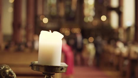 big candlelight with church in background