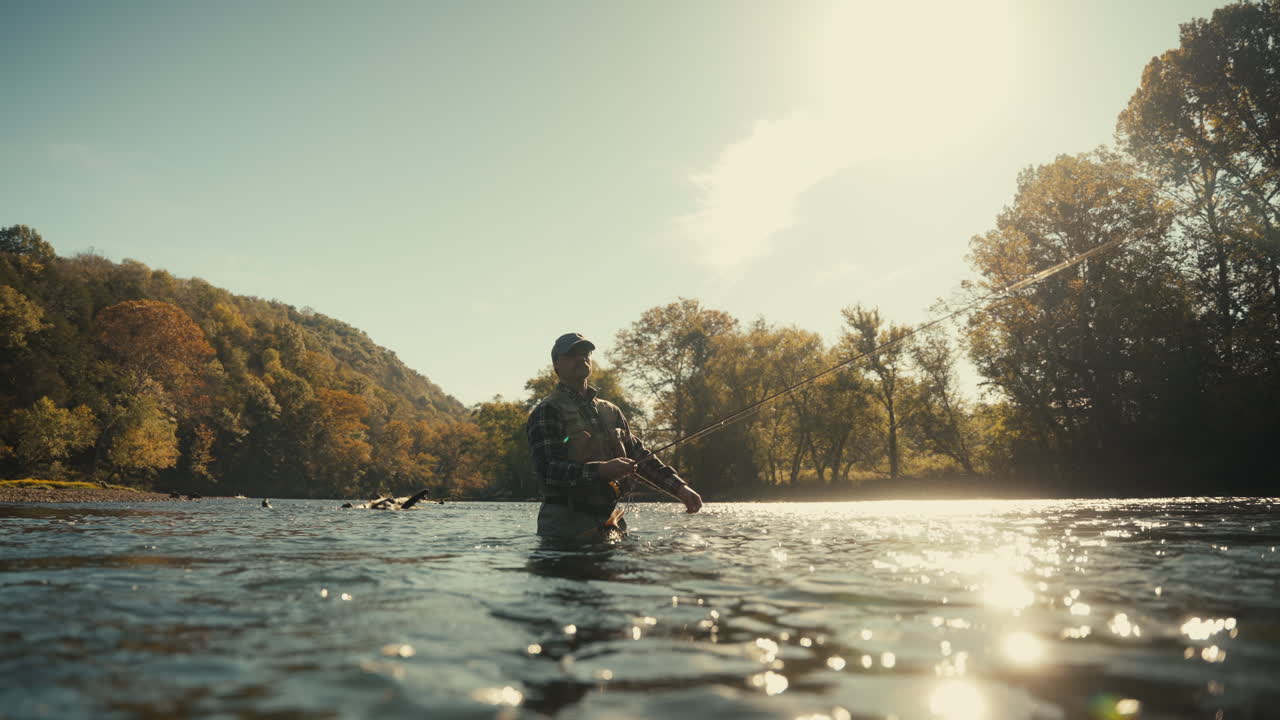 Man Fly Fishing in a River