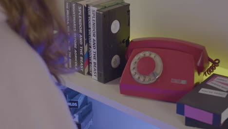 shelf with vhs cassettes