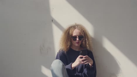 fashionable young woman in an abandoned warehouse