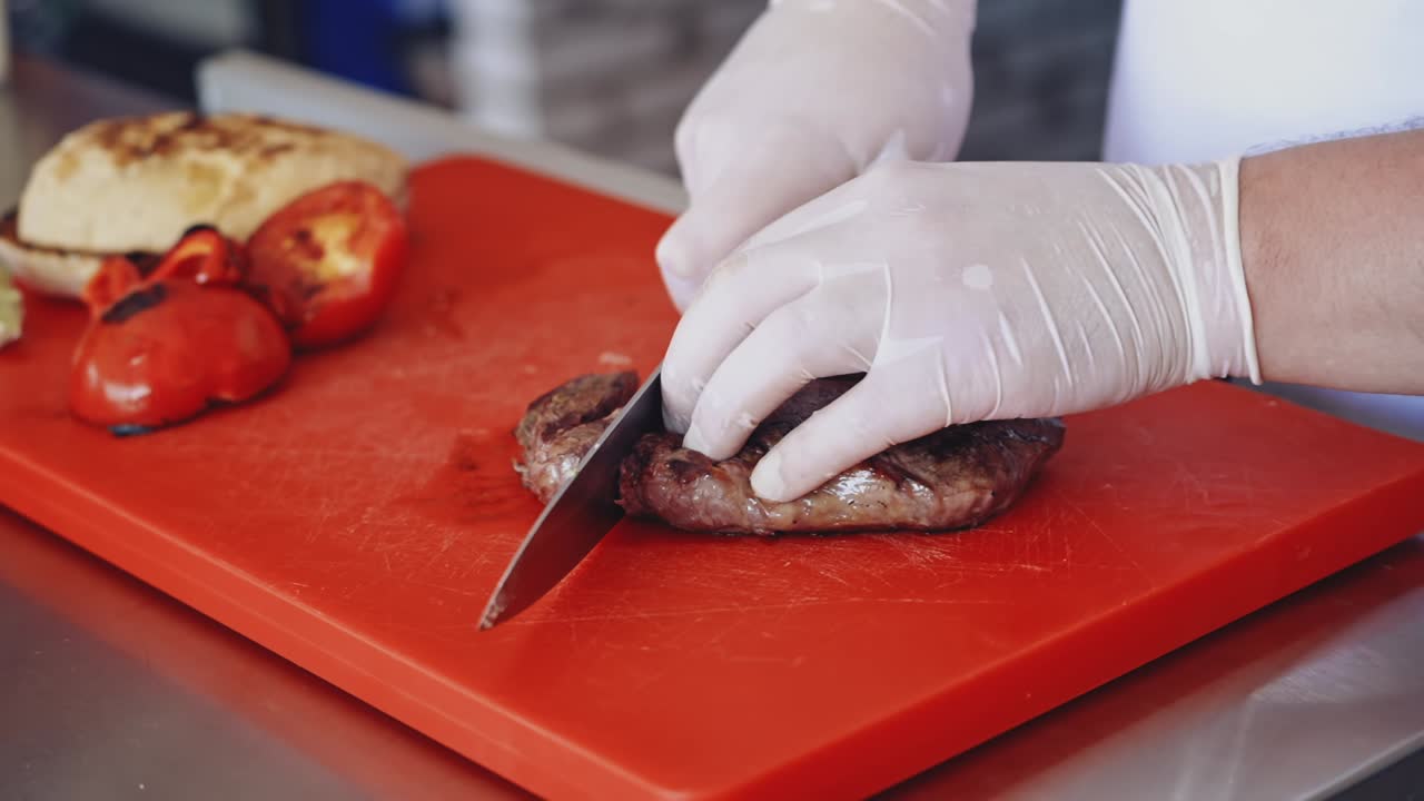 Chef decorating dish. Close up of chef hands preparing food