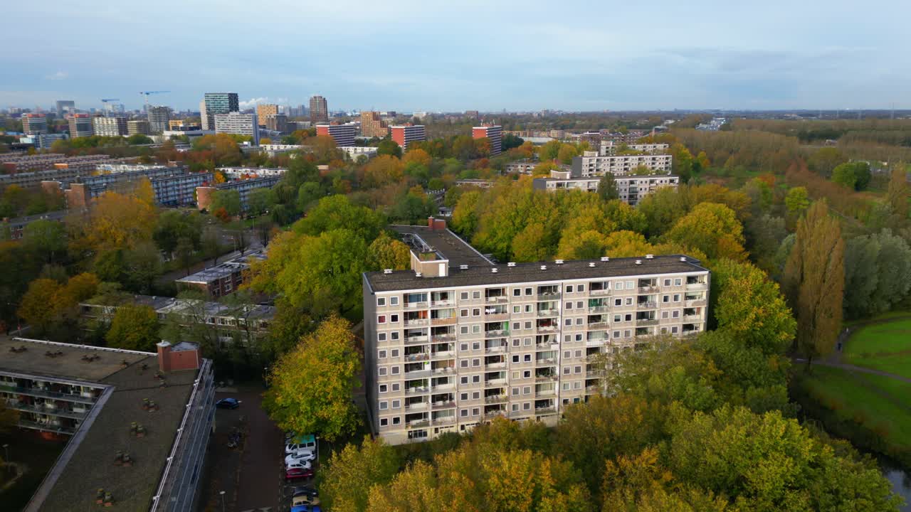 Approaching 70's appartment building in residential area Amterdam Noord