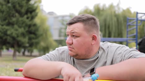 portrait of a young fat man he has obesity problem depression fatigue heaviness weight loss concept portrait of a young fat man he has obesity problem depression fatigue heaviness weight loss concept