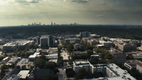 left to right aerial shot of downtown decatur georgia with the atlanta skyline in the background