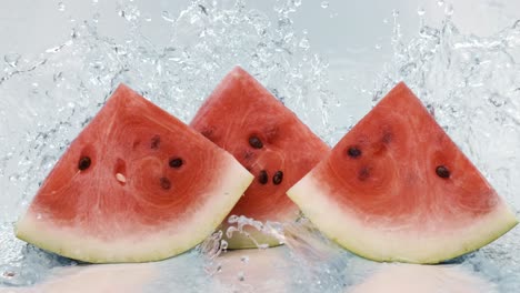 fresh water splash on red watermelon. shot on super slow motion camera 1000 fps.