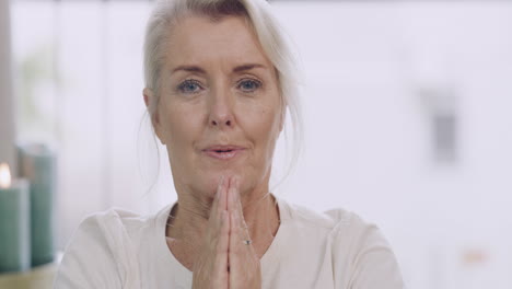 portrait of a senior caucasian woman meditating