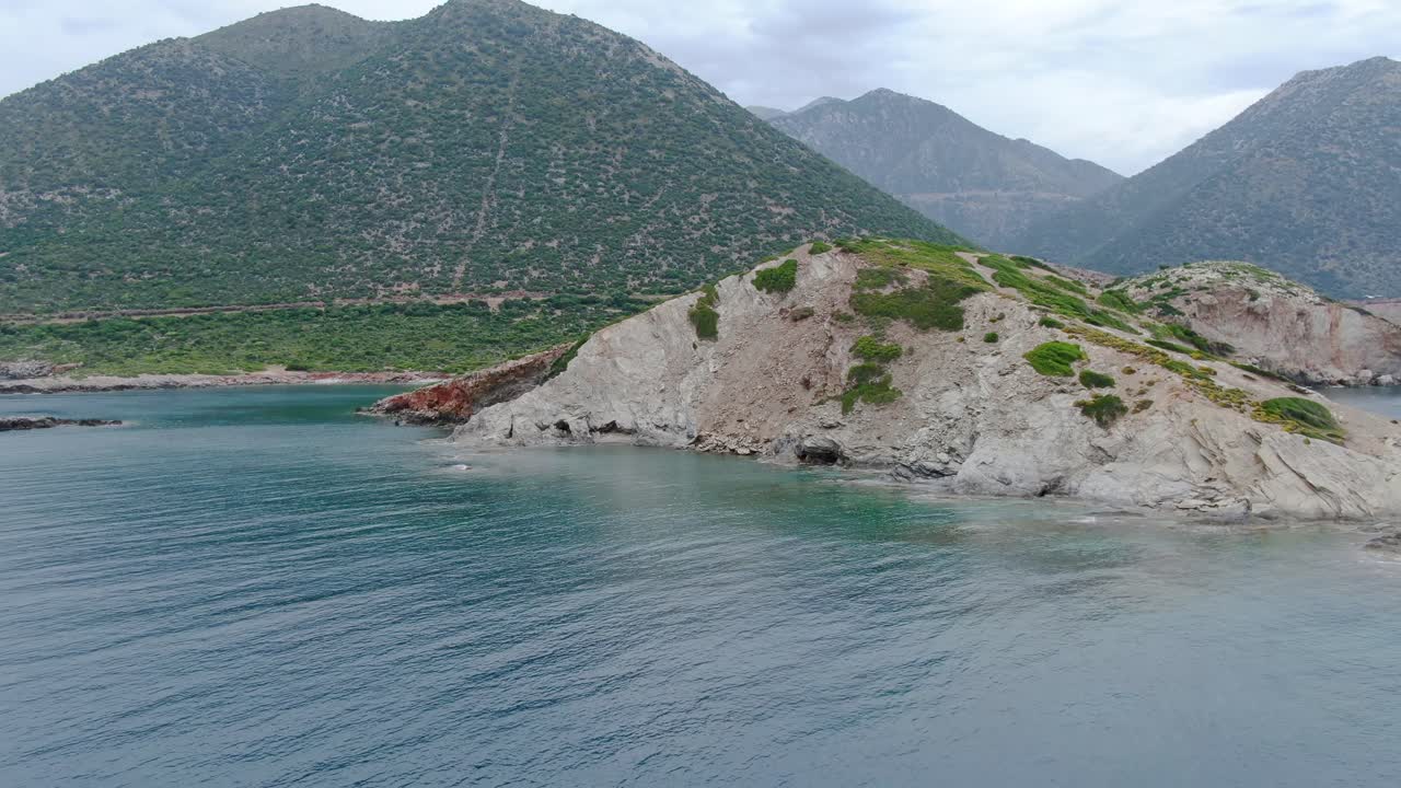 Aerial revealing rock formations and small islands on the coast of Crete Island, Greece