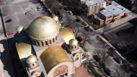 establishing drone shot above ukrainian village church in beautiful chicago, il
