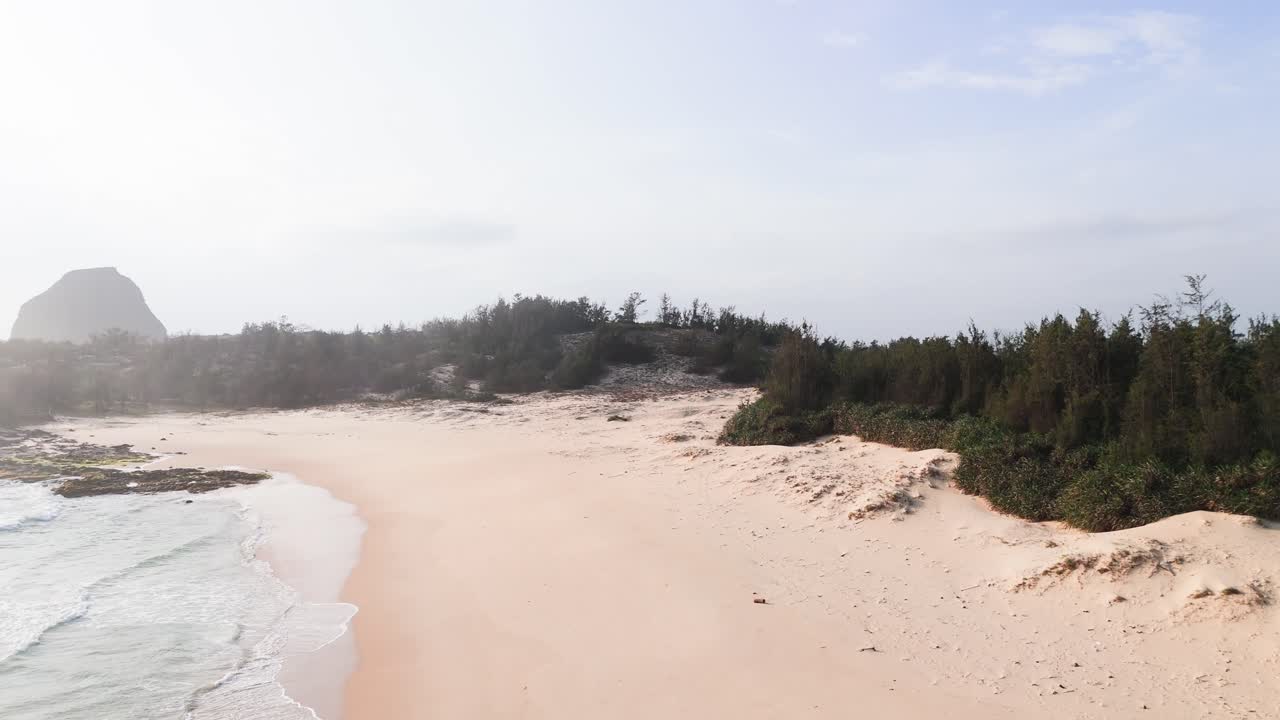 Aerial View Boom of Bãi TắM Hòn Choi Beach and the mountain.