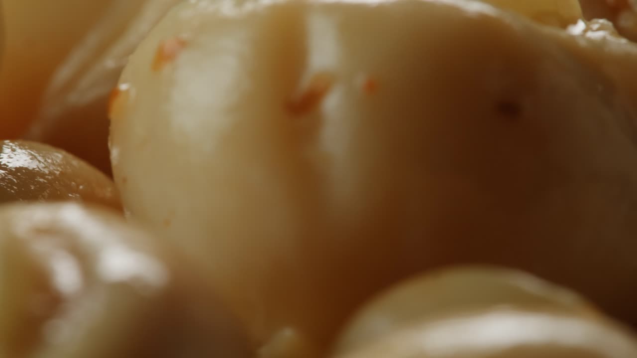 Fermented champignons, Jar with marinated mushrooms on wooden table, traditional salted marinated asian food.