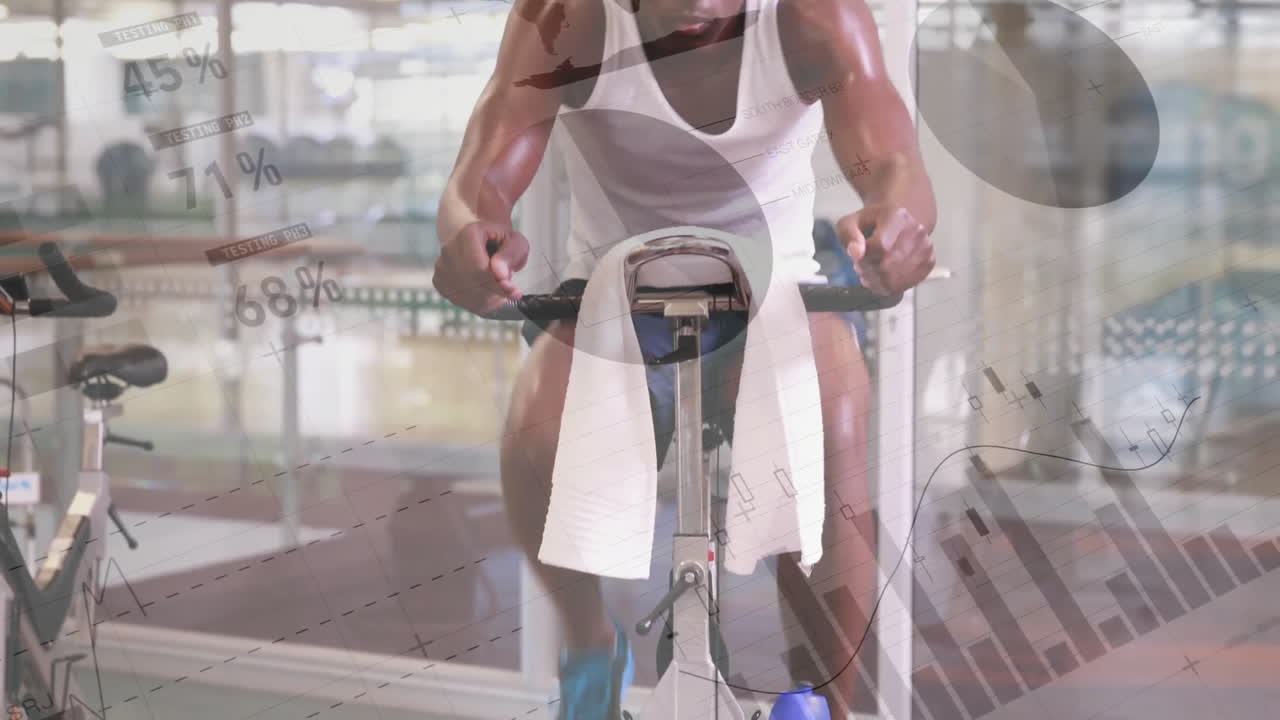 체육관에서 운동하는 아프리카계 미국인 남성에 대한 금융 데이터 처리의 애니메이션