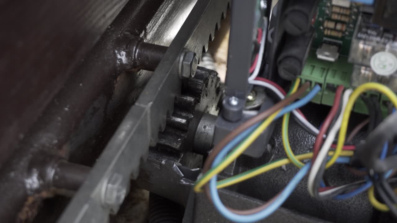 Gear motor that drives a rack, close up.