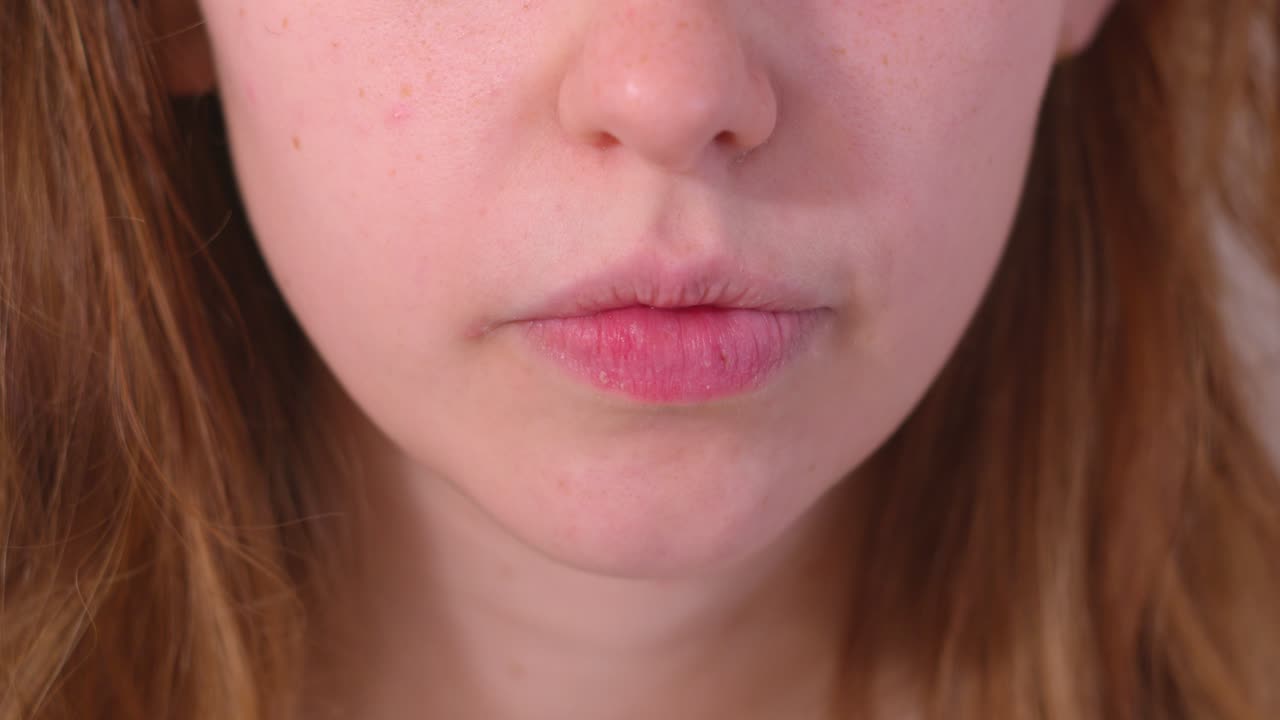 Close up of a young woman's mouth