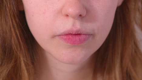 Close up of a young woman's mouth