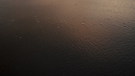 Sea-Waves-Washing-The-Shore-During-Sunset-In-Tropical-Beach