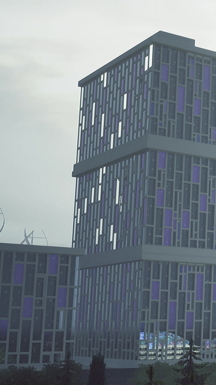 Two tall buildings are seen in a business district
