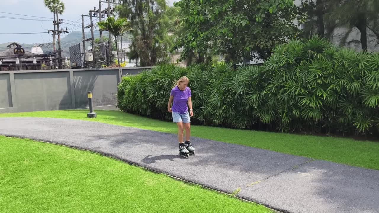 Woman Rollerblading in a Tropical Park