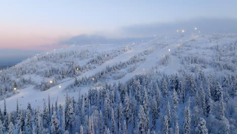 panoramic drone shot circling the slopes of sallatunturi, sunrise in finland