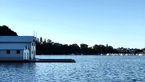 Boathouse-with-jetty-on-Swan-River-at-Peppermint-Grove,-Perth,-Western-Australia